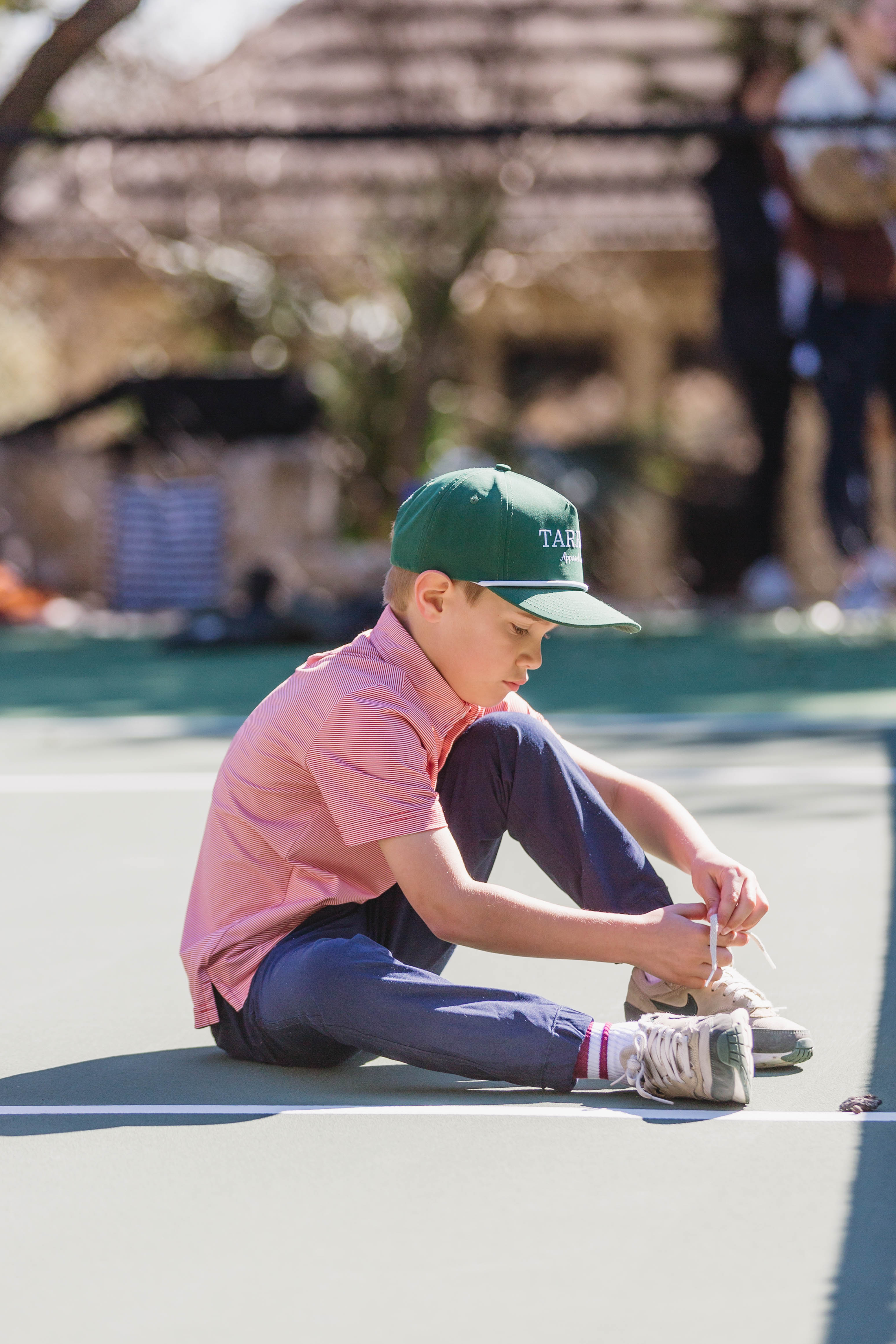 Boy on tennis court