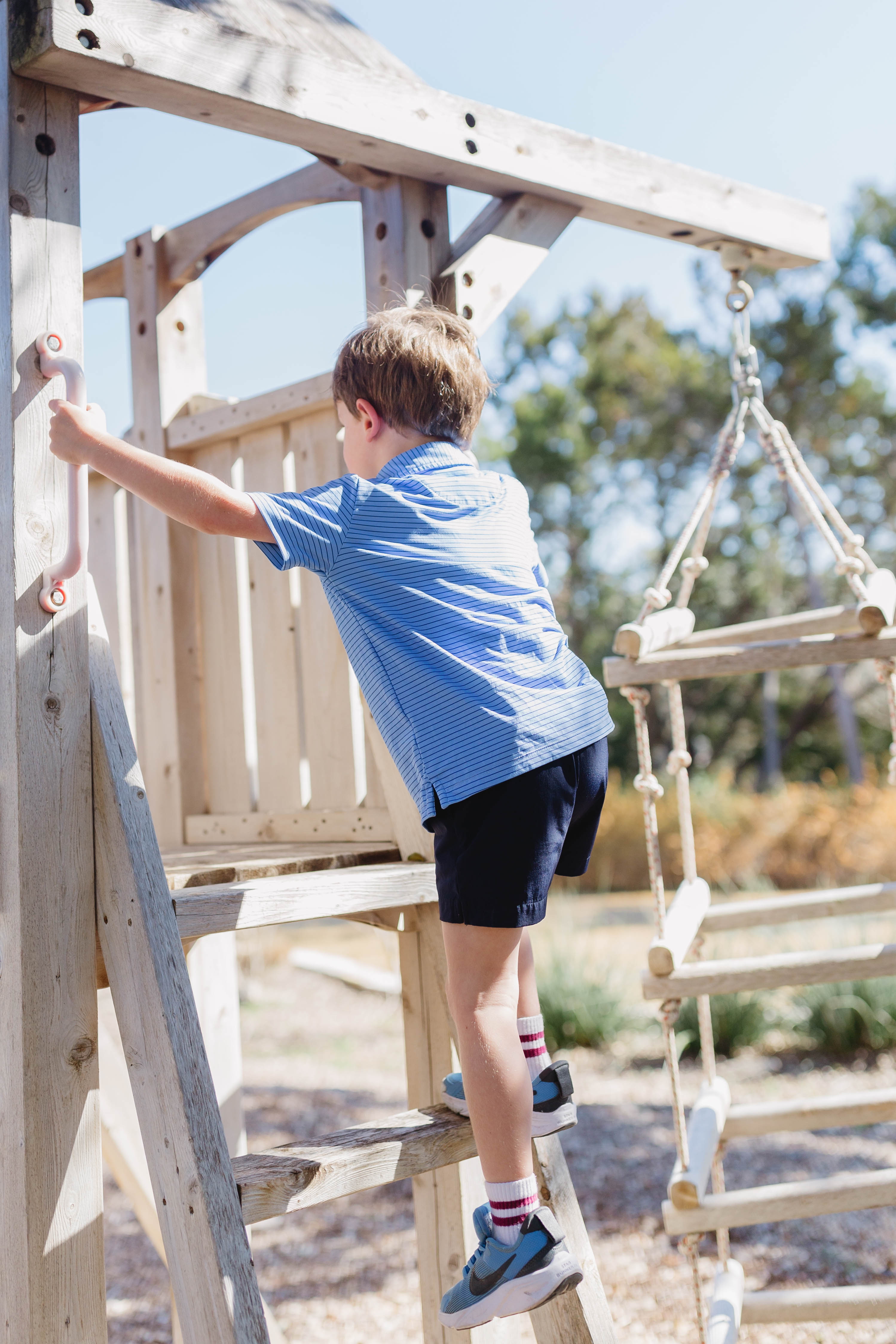 Boy playing wearing Tarry's clothes