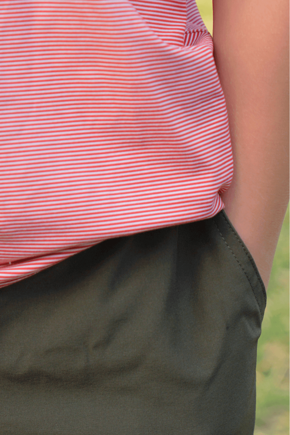 Close up of boys performance jogger in forest green