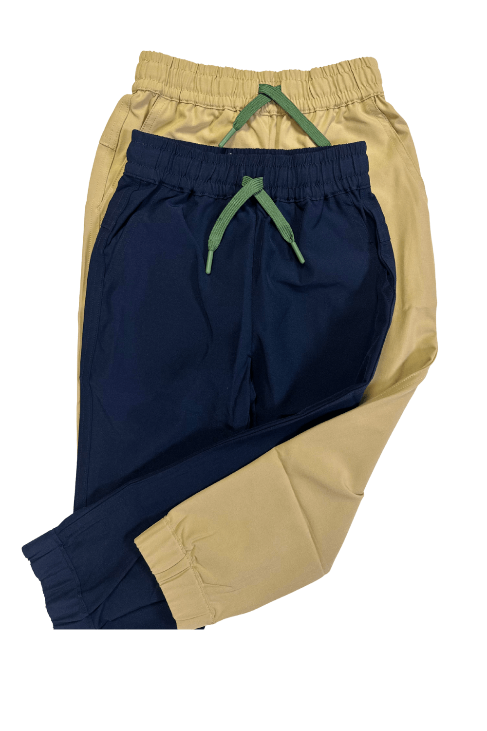 Tan and navy boys pants on a white background
